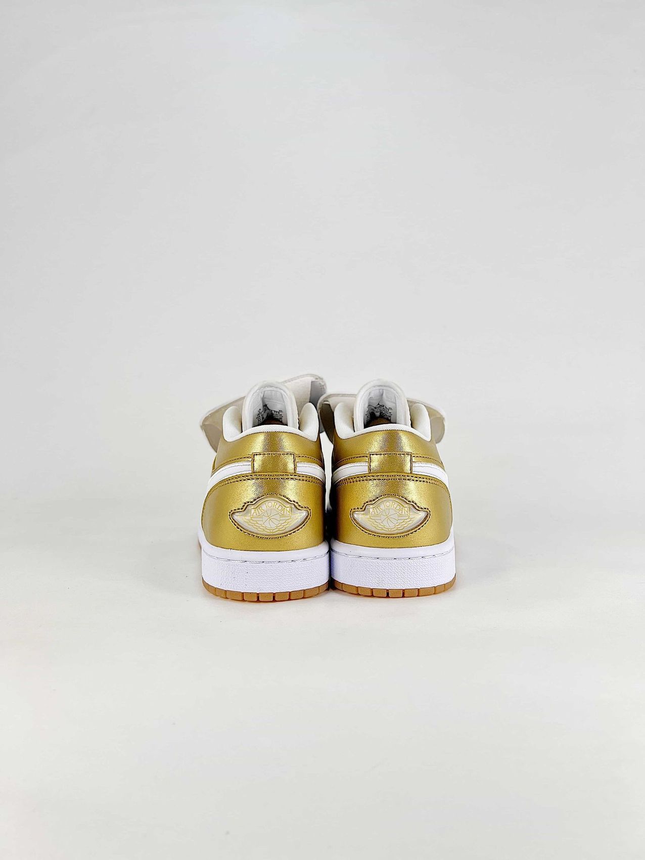AJ 1 Low ‘Gold Tiempo’ IR2304-703 AJ 1 Low ‘Gold Tiempo’ IR2304-703