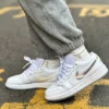 AJ 1 Low ‘Glitter Swoosh’ FQ9112-100