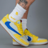 AJ 1 Low Travis Scott ‘Canary’ DZ4137-700