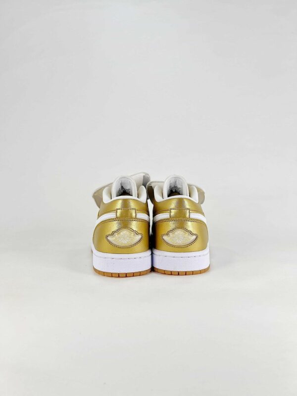 AJ 1 Low ‘Gold Tiempo’ IR2304-703 AJ 1 Low ‘Gold Tiempo’ IR2304-703