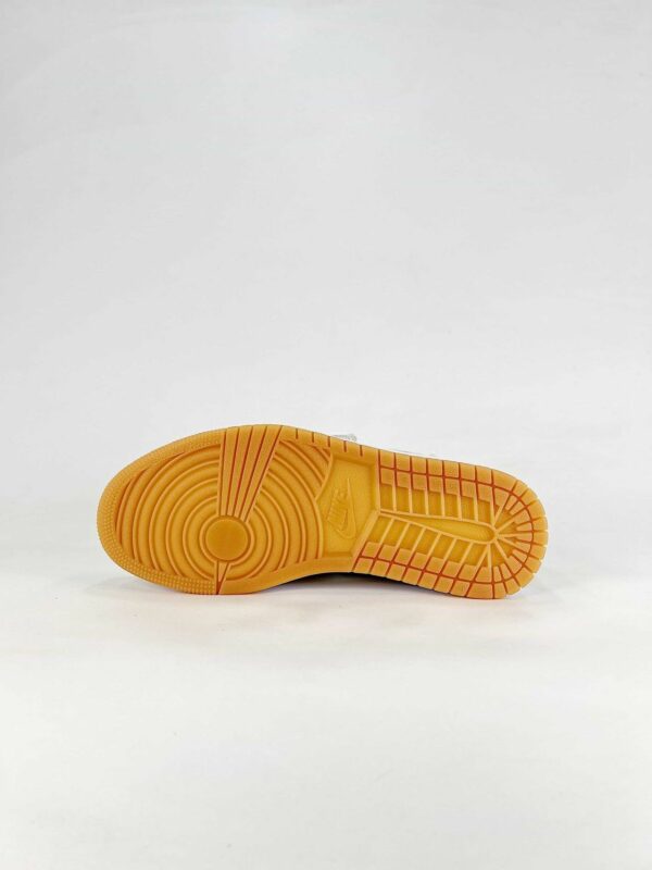AJ 1 Low ‘Gold Tiempo’ IR2304-703 AJ 1 Low ‘Gold Tiempo’ IR2304-703