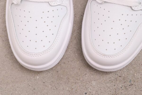 AJ 1 Mid ‘Triple White Patent’ BQ6472-100 AJ 1 Mid ‘Triple White Patent’ BQ6472-100