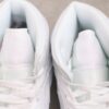 AJ 1 Mid ‘Triple White Patent’ BQ6472-100 AJ 1 Mid ‘Triple White Patent’ BQ6472-100