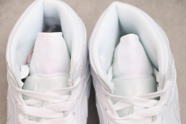 AJ 1 Mid ‘Triple White Patent’ BQ6472-100 AJ 1 Mid ‘Triple White Patent’ BQ6472-100