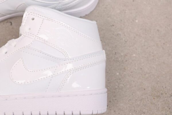 AJ 1 Mid ‘Triple White Patent’ BQ6472-100 AJ 1 Mid ‘Triple White Patent’ BQ6472-100