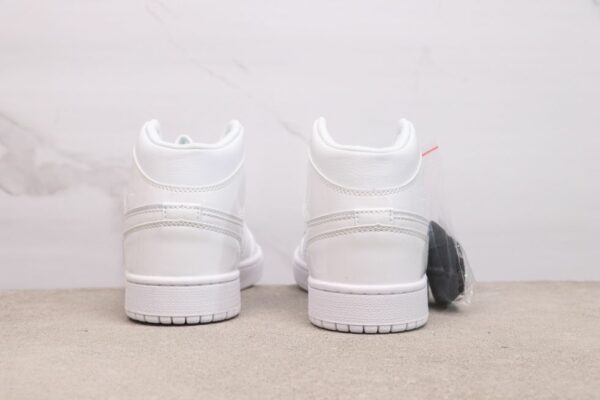 AJ 1 Mid ‘Triple White Patent’ BQ6472-100 AJ 1 Mid ‘Triple White Patent’ BQ6472-100