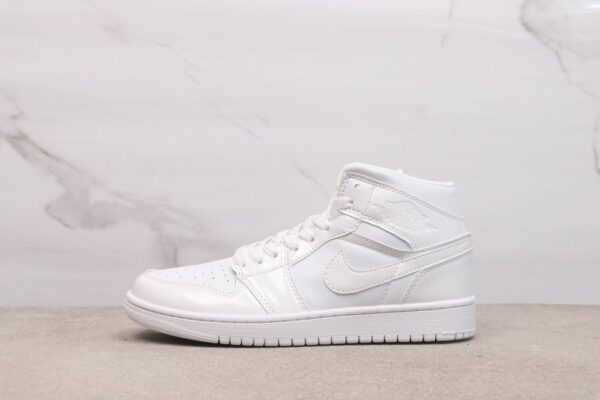 AJ 1 Mid ‘Triple White Patent’ BQ6472-100 AJ 1 Mid ‘Triple White Patent’ BQ6472-100