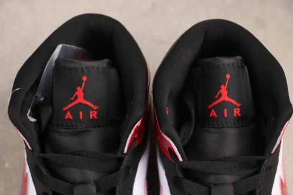 AJ 1 Mid ‘Patent Bred Toe’ HV4091-006 AJ 1 Mid ‘Patent Bred Toe’ HV4091-006
