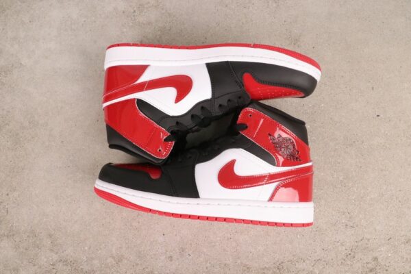 AJ 1 Mid ‘Patent Bred Toe’ HV4091-006 AJ 1 Mid ‘Patent Bred Toe’ HV4091-006
