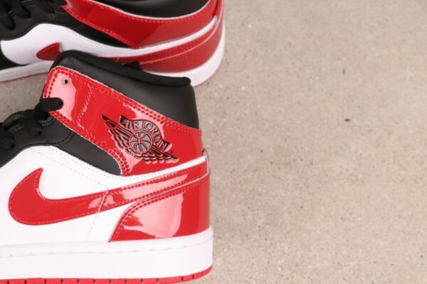 AJ 1 Mid ‘Patent Bred Toe’ HV4091-006 AJ 1 Mid ‘Patent Bred Toe’ HV4091-006