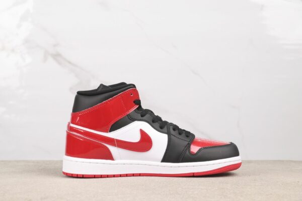 AJ 1 Mid ‘Patent Bred Toe’ HV4091-006 AJ 1 Mid ‘Patent Bred Toe’ HV4091-006