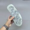 AJ 4 Retro x KAWS ‘Cool Grey’ 930155-003
