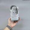 AJ 4 Retro x KAWS ‘Cool Grey’ 930155-003