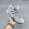 AJ 4 Retro x KAWS ‘Cool Grey’ 930155-003